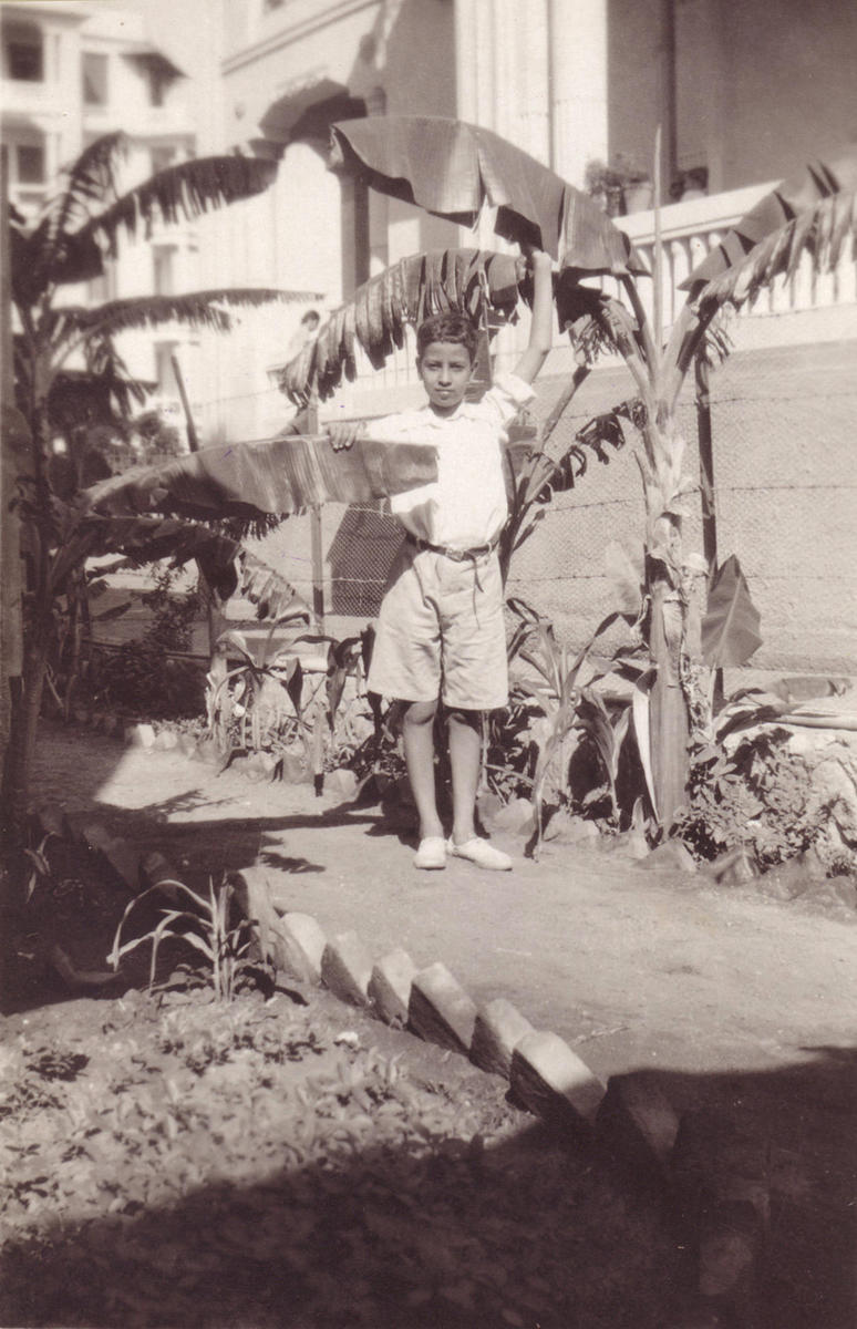 Halim El-Dabh touching the banana leaves to get the “sonic vibrations” from them on August 11, 1932 in Heliopolis, Egypt. Photo by Selim El-Dabh